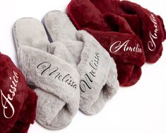 four personalized slippers are lined up on a white surface with the word, amalia written in cursive writing