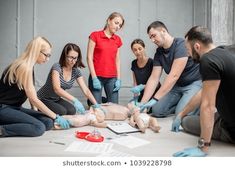 Group of people learning how to make first aid heart compressions with dummies during the training indoors #cpr, #group, #aid, #artificial, #caucasian, #class, #course, #crowd, #demonstrating, #dummy, #emergency, #event, #first, #health, #heart, #help, #human, #indoors, #instructor, #knowledge, #learn, #learning, #life, #lifeline, #medical, #men, #people, #person, #practice, #respiration, #resuscitation, #save, #saving, #seminar, #teach, #teaching, #training, #treat, #treatment, #women Training Photoshoot, Cpr Certified, Personal Care Routine, Home Health Aide