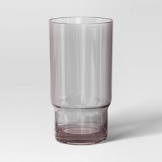 a clear glass sitting on top of a white table