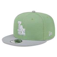 the new era los angeles dodgers hat in green and grey, with white lettering on the front