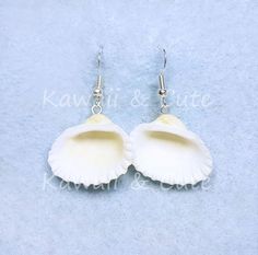 Marine Shells Earrings. Very light and comfortable to wear. We hope you like. Height 2 cm Width 2,5 cm Cute Adjustable Earrings For Beach, Cute Adjustable Earrings For The Beach, Novelty White Earrings For Gifts, Novelty White Earrings As A Gift, Handmade White Kawaii Jewelry, White Handmade Kawaii Jewelry, White Shell Jewelry Gift, Ocean-inspired Shell Earrings For Gifts, Ocean-inspired Shell Earrings As Gift