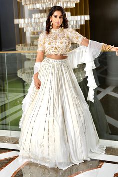 High Neck Lehenga Blouse, Party Wear Choli With Intricate Embroidery In Georgette, Party Wear Sharara With Embroidered Traditional Drape, Party Wear Sharara With Intricate Embroidery For Festivals, Party Wear Lehenga With Intricate Embroidery For Reception, Party Wear Embroidered Gown For Navratri, Navratri Party Gown With Intricate Embroidery, Embroidered Party Wear Choli For Reception, Embroidered Party Wear Gown For Navratri