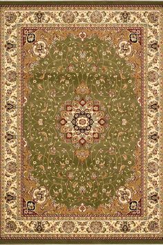 a green rug with an ornate design on the center and border in red, white, and