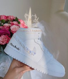 DESCRIPTION: Welcome! I've had years of experience in creating unique custom sneakers, but recently have discovered a newfound passion for designing special sneakers for brides! Reflecting on my wedding, I remember the agony and pain of wearing uncomfortable shoes that didn't match my dress.  Recently, one of my best friends was getting married and was facing the same issue, so I decided to surprise her with a custom pair of sneakers that would ensure she was comfortable enough to dance all nigh Sneakers For Bride, Jordan Aesthetic, Wedding Sneakers For Bride, Jordan Air Max, Bride Sneakers, Dream Wedding Shoes, Bridal Sneakers, Wedding Sneakers, Pearl Bride