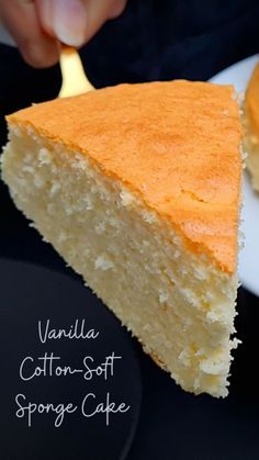 a slice of vanilla cotton - soft sponge cake on a plate