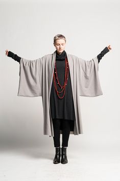 "This great Gray Unisex Japanese Haori kimono Jacket is a very chic addition to your wardrobe and upgrades any outfit. The Haori Kimono can be combined with most of your outfits, be it Pants, Jumpsuits, and skirts. This Haori is suitable for men and Women. Color: Light Gray. Material: Viscose MEASUREMENTS OF THE HAORI:ONE SIZE BODY PART: Bust - 126cm / 49\" inches Hips - 126 cm / 49\" inches Waist - 126 cm / 49\" inches Length (shoulder to bottom) 105 cm / 41\" inches SLEEVE: Length: 52cm / 20\" Oversized Outfit Women Street Style, Hooded Kimono Pattern, Haori Street Style, Japanese Boho Fashion, Modern Haori Outfit, Japanese Business Fashion, One Size Fall Outerwear With Kimono Sleeves, Fall Outerwear With Kimono Sleeves In One Size, Chic Winter Outerwear With Kimono Sleeves