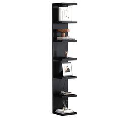 a tall black shelf with pictures and other items on it's sides in front of a white background