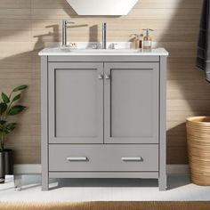 a white sink sitting under a mirror in a bathroom