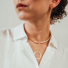 "This beautiful necklace is simple and elegant. I've formed a single piece of metal into a curved shape that sits at the collar bone. The metal is flattened in the front making the widest part of the necklace approximately 2mm. This necklace is approximately 5\" in diameter. This necklace can be great for everyday wear or for a special evening out. It's simple, clean and incredibly eye-catching. This necklace makes a great gift and comes with Premium Gift Wrap for secure shipping. Every piece is Minimalist Adjustable Choker Chain Necklace, Delicate Everyday Clavicle Chain Choker, Everyday Delicate Clavicle Chain Choker, Modern Everyday Chain Choker Necklace, Minimalist Bar Necklace With Delicate Chain, Minimalist Delicate Chain Choker Necklace, Elegant Everyday Hoop Necklaces, Minimalist Everyday Choker With Delicate Chain, Modern Everyday Clavicle Chain Choker