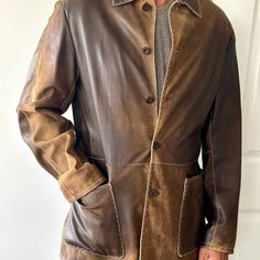 Button Front Beige Leather Jacket With Pockets, Made In Italy. Half Lined. Brand: Gimo's Color: Beige Size: Men's Large Us Size 40 Condition: Gently Pre-Owned, Please Feel Free To Message For Any Other Information Needed. Originally Purchased At Axels In Vail, Colorado Was $2,100 New Https://Axelsltd.Com/Collections/Mens-Leather-And-Suede-Jackets Size/Measurements 20" Shoulder 22" Chest 26" Sleeve 31" Length Designer Brown Notch Lapel Outerwear, Tailored Leather Outerwear, Tailored Leather Outerwear With Long Sleeves, Tailored Leather Long Sleeve Outerwear, Tailored Leather Jacket With Hidden Button Closure, Designer Single Breasted Long Sleeve Leather Jacket, Single Breasted Leather Sport Coat With Long Sleeves, Brown Sport Coat With Snap Buttons, Brown Long Sleeve Sport Coat With Snap Buttons