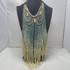 Gimmicks Green Tie Dye Fringe Fabric With Gold Chain Necklace Length 18 Inches Adjustable Fringe Necklace For Beach, Bohemian Chain Necklaces For Beach, Gold Beach Jewelry With Beaded Fringe, Green Fringed Beach Jewelry, Bohemian Beaded Chain Necklace For Festivals, Bohemian Chain Necklaces For Summer, Green Bohemian Necklace With Chain, Bohemian Green Chain Necklace, Fringe Fabric