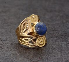 SIZE :- All Size Are Available. US1 TO US16, If Your Size Not Listed Feel Free to Contact us METAL :- Brass STONE;- Lapis Lazuli Ring can be customized on request and gemstone can be made to any gemstone you want. Same Design Ring Are Upload With Any Gemstone. Please Visit Our Shop to View Complete Collection. If You Need Faster Shipping, Please Contact us Please Make Sure to Include The Correct Address During Before Order. You Can return Item within 30 Days After Successful Delivery. We Offer 1 Bohemian Yellow Gold Jewelry For Anniversary, Bohemian Adjustable Flower Ring For Anniversary, Handmade Bohemian Ring For Anniversary, Bohemian Handmade Rings For Anniversary, Handmade Adjustable Antique Rings, Handmade Bohemian Yellow Gold Rings, Bohemian Gemstone Flower Ring As Gift, One Of A Kind Adjustable Wedding Ring, Bohemian Gold Rings With Gemstones