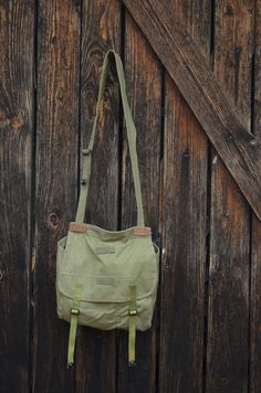 "DIMENSIONS: Bag: 32 x 32 x 12 cm / 12.5 x 12.5 x 5 inches Strap: ~ 125 cm / ~49\" CONDITION: Good vintage condition. This is an unused vintage military bag, it was deposited for long years so there may be a tiny scent that I find negligible and that will go away with time. If you want your bag to smell like new you can wash it when you receive it. Being made of fabric it is really easy to wash, I would recommend you to wash it by hand to preserve the colors better. Some of the metal parts may b Vintage Crossbody Bag With Pockets, Vintage Green Shoulder Bag For Daily Use, Vintage Green Shoulder Bag With Large Capacity, Vintage Flap School Bag, Green Vintage Shoulder Bag With Large Capacity, Vintage Green School Bag, Green Vintage School Bag, Vintage Satchel Shoulder Bag With Pockets, Vintage Khaki Shoulder Bag For Everyday