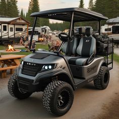 a golf cart parked in front of a camp site