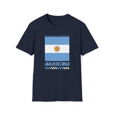 Introducing our Argentina Retro T-Shirt, a contemporary take on casual comfort that seamlessly blends style with an international vibe. Featuring a retro style print design inspired by the national flag and crafted from exceptionally soft materials, this softstyle unisex tee is a wardrobe essential that combines a luxurious feel with unmatched durability. It's a great gift for world travel lovers and the perfect way to show off the place you love. Made with care, our shirts are 100% cotton for solid colors, while Heather colors and Sport Grey incorporate a touch of polyester for added versatility. The twill tape on the shoulders enhances durability, and with no side seams, this shirt ensures a smooth and comfortable fit. The ribbed knitting on the collar prevents curling damage, ensuring a Flag Print Graphic Tee With Crew Neck, Graphic Tee With Flag Print And Crew Neck, Casual Flag Print Top For Fans, Graphic Tee With Flag Print Crew Neck, Cotton Graphic Tee With Flag Print, Casual T-shirt With Flag Print And Relaxed Fit, Casual Relaxed Fit T-shirt With Flag Print, Casual Crew Neck T-shirt With Flag Print, Casual Streetwear T-shirt With Flag Print