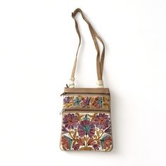 Gorgeous Crossbody Bag That Has Never Been Used. Beautifully Detailed Crewelwork Embroidery, Lends Homespun Artistic Flair To This Practical, Goes-With-Everything Bag. 100% Leather Made In India Embroidered Crossbody Shoulder Bag For Everyday Use, Embroidered Leather Crossbody Bag, Embroidered Leather Travel Bags, Embroidered Beige Leather Bag, Beige Embroidered Leather Bag, Embroidered Leather Satchel For Everyday Use, Embroidered Leather Bags For Daily Use, Multicolor Hand Tooled Travel Bags, Embroidered Brown Crossbody Shoulder Bag