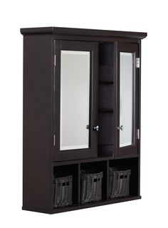 an armoire with two doors and baskets underneath it