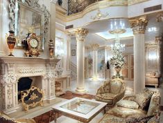 an ornate living room with gold and white decor