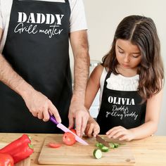 a father and daughter preparing food together