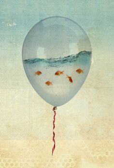 a balloon floating in the air with water on it