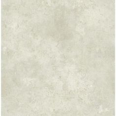 a white wallpaper background with some light colored paint on it's walls and floor