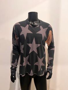 VINTAGE VIVIENNE WESTWOOD MAN Pirate Style Top in star patterned print The oversized and asymmetrical fit is what makes this special piece of fashion history so unique, also with extra long sleeves.  Two colour ways/print  front & back In good condition.  Made in Italy  Size 44. cotton stretch fabric Oversized Long Sleeve Tops With Star Print, Casual Long Sleeve Star Print Tops, Long Sleeve Tops With Star Print For Fall, Long Sleeve Star Print Tops For Fall, Relaxed Fit Star Print Top For Fall, Oversized Star Print Crew Neck Top, Oversized Crew Neck Top With Star Print, Relaxed Fit Star Print Top For Streetwear, Long Sleeve Star Print Tops For Streetwear