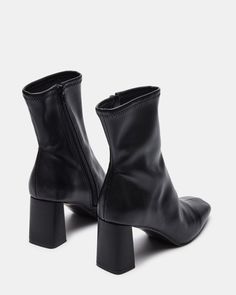 For the perfect seasonal transition style, look no further. HUSH is a sleek ankle boot with a sock-like fit and brings a chic touch to these versatile booties. 2.75 inch heel height 9.5 inch shaft circumference 6.25 inch shaft height Vegan leather or synthetic upper material Textile and vegan leather lining Vegan leather sock Synthetic sole Imported Black Ankle Boots Aesthetic, Modern Ankle-high Heeled Boots With Padded Ankle, Sleek Boots With Reinforced Heel For Fall, Modern Medium Width Winter Boots, Modern High Ankle Boots For Fall, Fall Medium Width Ankle Heeled Boots, Modern Mid-calf Boots With Medium Width, Fall Season Ankle Platform Boots With Padded Heel, Fall High Ankle Boots With Padded Heel