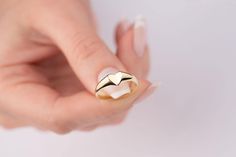 Our signet heart ring is 14k solid gold. Our gold heart ring has a unique style with looks like a folded heart. It fits your all outfit and becomes your everyday ring. When you think of our 14k gold heart ring as a gift, it is a product that will make your loved ones happy on their birthday, Valentine's day, Mother's day, anniversaries, graduations, Christmas gift or other special days. Also, it can be a perfect gift for yourself. :) 🎁 If you want, you can add a gift note for your loved ones. It arrives in a special jewelry gift box. ✨ We respond to your questions happily. Your question will be answered within 24 hours. Do not hesitate to contact us. 💎 I hope you have a lot of Onseva's designs. :) a.b.-G Elegant Tiny Heart Ring, Elegant Tiny Heart Ring For Valentine's Day, Elegant Valentine's Day Heart Ring, 14k Gold Heart Ring For Everyday, Simple Yellow Gold Heart Ring For Anniversary, Gold Minimalist Signet Ring For Valentine's Day, Minimalist Gold Signet Ring For Valentine's Day, Everyday 14k Gold Heart Ring, Gold Heart-shaped Minimalist Signet Ring