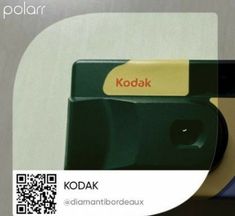 a close up of a cell phone with a kodak sticker on it