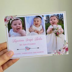 a person holding up a card with two pictures of babies on it and flowers in the background