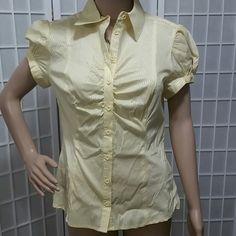 Nwt Bebe Junior Size Large Yellow Button Front Short Sleeved Shirt. Great Condition. Has Silver Threads In Material. Material Content 54% Cotton, 28% Nylon, 15% Polyester Measurements Aprox: Pit To Pit 18” Length 24” Button Front Shirt, Shirt Color, Short Sleeve Shirt, Colorful Shirts, Button Down Shirt, Womens Tops, Yellow, Silver, Women Shopping