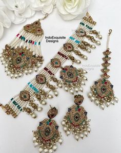 Elegant Pakistani bridal set/Pakistani Jewelry/ Indian and Pakistani wedding jewelry/ Bollywood jewelry/ kundan and Polki jewelry This elegant choker set comes with Earrings, tikka and Jhoomer/Passa. All items are shipped from Brampton, Ontario, Canada. If you need your item by a certain day, please reach out to us for express delivery option before placing the order so that we can update the shipping for you. Standard shipping/delivery timeline Below are the delivery timeline estimates. We dispatch all orders by the next business day. ---> USA delivery timeline * 4-8 business days to major urban centers in USA. It may take 2-3 days extra to remote locations ---> Canada delivery timeline  * 2-3 business days - GTA  & Montreal  * 2-4  business days - Rest of Ontario/Quebec * 4-8 business da Traditional Multicolor Hand Set Bridal Sets, Bollywood Style Multicolor Jewelry Sets For Ceremonial Occasions, Bollywood Style Multicolor Ceremonial Jewelry Sets, Multicolor Chandbali Bridal Sets With Tilla, Traditional Multicolor Bridal Sets With Stone Work, Multicolor Kundan Hand Set Bridal Sets, Multicolor Kundan Bridal Sets Hand Set, Hand Set Multicolor Kundan Bridal Sets, Multicolor Hand Set Kundan Bridal Sets