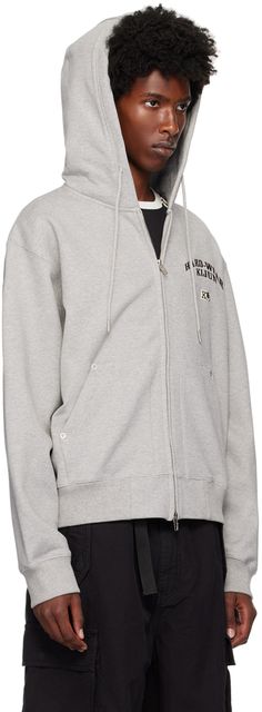 French terry hoodie. · Drawstring at hood · Two-way zip closure · Logo embroidered at chest · Rivets at patch pockets · Rib knit hem and cuffs · Dropped shoulders · Silver-tone hardware Supplier color: Melange grey French Terry Hoodie, Drawstring Hoodie, Rivets, Logo Embroidered, Drop Shoulder, French Terry, Zip Hoodie, Patch Pocket, Rib Knit