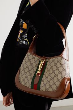 Beige Jackie 1961 small webbing-trimmed coated-canvas and leather shoulder bag | GUCCI | NET-A-PORTER Gucci Handbag, Counter Decor, Bathroom Counter, Latest Bags, Dior Handbags, Gucci Fashion, Bags Aesthetic, Gucci Handbags, Gucci Bags