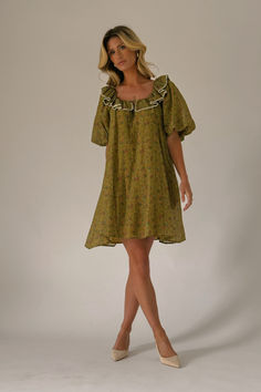 the answer to your puff sleeve prayers, this mini dress will take you from day to night, season after season. it features a dainty ruffle neckline, dramatic puff sleeves, + a muted multi-color floral pattern. with its relaxed silhouette + flowy shape, it’s the perfect puff sleeve mini dress to pair with your favorite heels, boots, sandals, or sneaks. Cute Family Pictures, Mini Dres, Puff Sleeve Mini Dress, Denim Midi Dress, Family Picture Outfits, Rust Dress, Engagement Photo Outfits, Family Picture, Picture Outfits