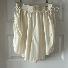 Free People Movement Ivory Shorts. Nwot Size S. Definitely Fits A Med. Ruched Sides. Adjustable Elastic Waist With Side Ties. Fully Lined. Silky Soft. Oversized Reposh From @Faith_warrior13. Just Didn’t Fit Me. Excellent Condition. Exact Same Pair Sold On Posh For $56. Free People Boho, Free People Shorts, Free People Movement, Fp Movement, Shorts Athletic, Athletic Shorts, Boho Shorts, Elastic Waist, Free People