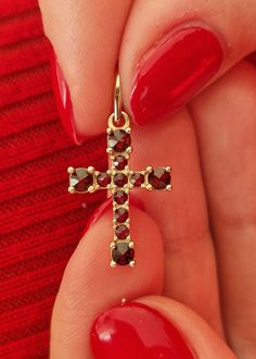 1. Sterling Silver Cross 925/1000 - 22 K Weight - 1.4 grams 2. Yellow Gold Cross 585/1000 - 14 K Weight - 1.56 grams 3. White Gold Cross 585/1000 - 14 K Weight: 1.56 grams Stone: Czech mineral, Unique Czech Garnet - Pyrope Series: Garnet scattering Brand: A-B Production: Czech Republic A cross with natural Czech garnet is a stylish and bright accessory. It has a symbolic meaning and serves as a talisman or complement the original image. Garnet is a stone of exceptional beauty, so there is no point in giving the cross a complicated and ornate shape. This will detract from the unique cut and inner facets of the bright stone. A restrained laconic shape is the best choice for a stone with strong energy and eye-catching beauty. The cross looks very nice on a silver chain. Moreover, you should c Diamond-cut Ruby Jewelry For Gifts, Diamond-cut Ruby Jewelry As Gift, Diamond Cut Ruby Jewelry As Gift, Hallmarked Yellow Gold Ruby Jewelry, Luxury Garnet Birthstone Jewelry, White Gold Ruby Jewelry Gift, Spiritual Garnet Birthstone Jewelry, Gemstone Cross Pendant Jewelry Gift, White Gold Ruby Birthstone Jewelry