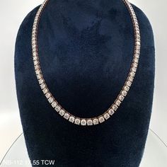 Discover the beauty of understated elegance with this 17.55 Cts. Natural Round Diamond Eternity Necklace. Crafted with an intricate, radiant pattern of flawless round diamonds, this design exudes luxury and refinement, for the woman of taste and sophistication. DIAMOND 17.55 RD TCW 110 PCS G-I SI1-SI214K RG 23.45 GRAMS SIZE 17" NB-112 Classic Formal Tennis Necklace With Lab-grown Diamonds, Classic Formal Tennis Necklace With Lab Grown Diamonds, Timeless Diamond White Tennis Necklace, Luxury Lab Grown Diamond Tennis Necklace For Formal Events, Luxury Cubic Zirconia Diamond Necklace With Brilliant Cut, Elegant Tennis Necklace With Lab-grown Diamond Accents, Elegant Silver Tennis Necklace With Lab Grown Diamonds, Elegant Tennis Necklace With Diamond Accents, Elegant Tennis Necklace With Lab Grown Diamonds