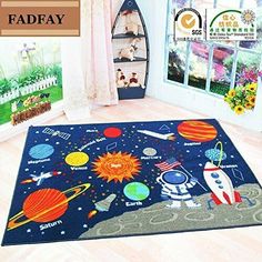 a child's room with an area rug that has various planets and stars on it