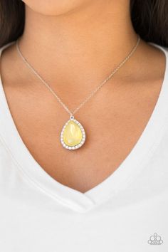 Featuring an iridescent finish, a dramatic yellow teardrop gem is pressed into a shimmery silver frame radiating with glassy white rhinestones. The glamorous pendant swings from the bottom of a dainty silver chain below the collar for a timeless finish. Features an adjustable clasp closure. Sold as one individual necklace. Includes one pair of matching earrings. P2RE-YWXX-066XX Paparazzi Accessories Jewelry, Yellow Necklace, Yellow Jewelry, Paparazzi Accessories, White Rhinestone, Silver Engagement Rings, Affordable Jewelry, Paparazzi Jewelry, Blue Necklace