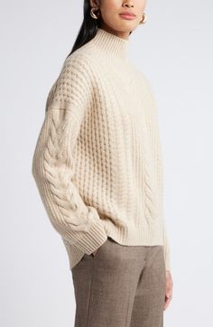 Find NORDSTROM High Low Mock Neck Fisherman Sweater on Editorialist. You may not be sailing the North Sea but you can layer up for any weather in the warmth of this wool-warmed sweater knit with a cable pattern inspired by fisherman styles from Ireland. Mock neck Long sleeves with ribbed cuffs 53% recycled polyester, 25% wool, 19% acrylic, 3% spandex Hand wash, dry flat Imported Sweater Nordstrom, Cable Pattern, Fisherman Sweater, North Sea, Sweater Knit, Mock Neck, High & Low, High Low, Sweater Top