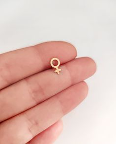 "14K 9K Solid Gold Female Venus Symbol Stud Earrings, Small Feminine Symbol Studs, Feminism Jewelry, Feminist Post Earrings, Girl Power, Gift for Her, Girlfriend Gift, FREE EXPRESS SHIPPING Small Venus/Female symbol Stud Earrings made in Solid/Real Gold Venus Symbol: Venus' symbol has more than one meaning. Not only is it the sign for \"female\", but it also represents the goddess Venus' hand mirror. This representation of femininity makes sense considering Venus was the goddess of love and beau Venus Symbol, Feminine Symbols, Female Symbol, Hand Mirror, Girlfriend Gift, Single Earring, Moon Pendant, Signet Ring, Real Gold