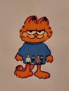 an orange and black cat with glasses on it's face is standing in front of a group of people