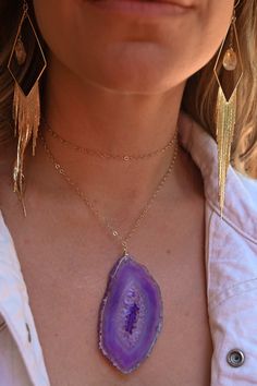 A statement necklace for every Bohemian girl's Fierce Forward jewelry collection! This purple Geode necklace is beyond cool. Wear it with a dress, a tank, and a leather jacket, or as the main show of your outfit going out to a concert or date night out. Hands down, this necklace will have people looking your way! Agate is a grounding stone to stabilize and keep you rooted in who you are and your purpose. Purple Agate pendant 40-50mm *every stone is one of a kind 14k gold fill cable chain 3x4mm H Chic Adjustable Chain Jewelry For Festivals, Chic Festival Necklace With Adjustable Chain, Purple Party Jewelry With Adjustable Chain, Bohemian Purple Necklaces For Parties, Bohemian Purple Necklace For Party, Adjustable Purple Necklaces, Adjustable Purple Necklace, Purple Agate Stone Jewelry, Elegant Purple Agate Jewelry