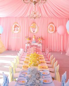 a table set up for a princess birthday party