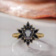 🖤Setting Total Carat Weight: 1.8 Carats 14K Yellow Gold Certificate Of Authenticity Included 🖤Main Diamond: Shape: Oval Weight: 1 Carats Color: Fancy Black Clarity: Opaque Color Origin: Enhanced Color Distribution: Even Grade: AAA Measurements: mm Stock ID: 🖤Accent Diamonds Shape: Round & Marquise & Pear Weight: 0.8 Carats Color: Black Clarity: Opaque Color Origin: Enhanced Color Distribution: Even Grade: AAA Stock ID: Notes: 🖤All diamonds are natural, earth-mined diamonds that were suitable Diamond Alternative Engagement Ring, Black Diamond Earrings Studs, Black Diamond Necklace, Black Diamond Studs, Gold Certificate, White Diamond Earrings, Black Diamond Earrings, Ring Cluster, Marriage Party