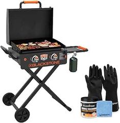 an outdoor grill with gloves and cooking utensils next to it on a white background