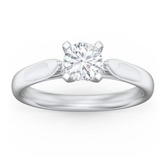 a white gold engagement ring with a round diamond in the center and two clawed shoulders