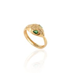 This is part of Chairish’s Fine Jewelry assortment.  Statement Diamond and Natural Emerald Snake Head Ring in 18K Gold featuring natural emerald of 0.19 carats and diamonds of 0.14 carats. The gorgeous handcrafted ring goes with every style. Emerald enhances intellectual capacity of the person. Designed with a serpentine head studded with diamond on top with emerald studded in the eye and the body of the snake connects with the head making a ring. This unique snake head ring is a perfect fit to wear it on your occasion or style it with any of your basic outfit to give it a glam. This is a perfect Unique Gift, Bridal Shower Gift, Secret Santa Gift, Gift For Sister, Mother Daughter Gift, Bride To Be Gift, Bridesmaid Gift, Thanksgiving Gift, Christmas Gift or any Holiday Gift for Mother, Sist Luxury Green Rings With Single Cut Diamonds, Luxury Green Emerald Ring With Single Cut Diamonds, Luxury Yellow Gold Emerald Ring With Single Cut Diamonds, Luxury May Birthstone Diamond Ring With Accents, Luxury Diamond Ring With May Birthstone Accents, Luxury Green Rings With Diamond Accents, Luxury Emerald Rings With Diamond Accents, Luxury Emerald Rings With Rose Cut Diamonds, Luxury Yellow Gold Tsavorite Rings