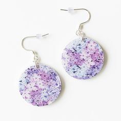 These purple floral earrings are perfect for summer! They are hypoallergenic and lightweight. SIZING: Earrings are approximately 1 inch wide & 1 inch long. Drop length is approximately 1 3/4 inches.  MATERIALS: Silver stainless steel earring hooks are hypoallergenic and will not tarnish. Jump rings are sterling silver. Earrings are made of acrylic.  PACKAGING: Earrings arrive in a cotton filled swirl white jewelry box gift case. Perfect for gift giving! SHIPPING: All orders are shipped in 1-3 bu Summer Hypoallergenic Multicolor Jewelry, Nickel Free Flower Earrings For Summer, Trendy Summer Flower Charm Earrings, Summer Multicolor Hypoallergenic Earrings, Nickel-free Flower Drop Earrings For Summer, Multicolor Summer Flower Charm Earrings, Summer Multicolor Earrings With Flower Charm, Summer Hypoallergenic Drop Flower Earrings, Summer Multicolor Flower Charm Earrings